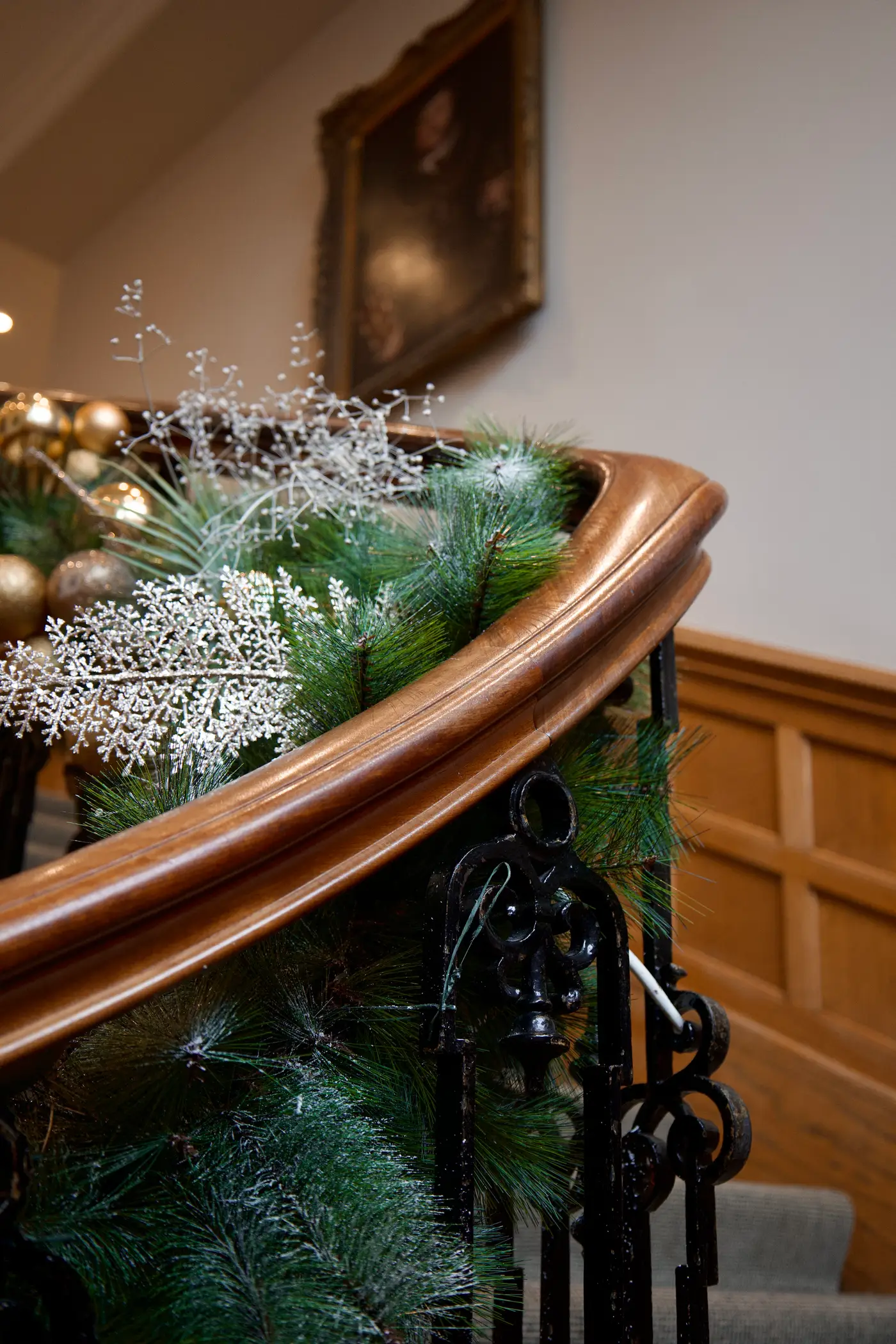 Christmas decorations on the staircase at Oatlands Park Hotel